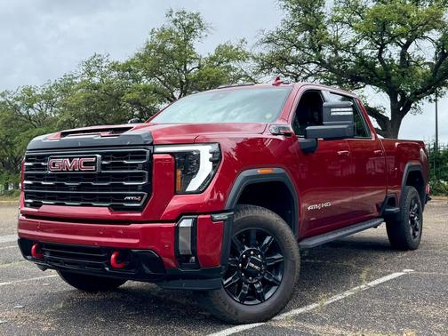 Volcanic Red Tintcoat 2024 GMC Sierra 2500 AT4