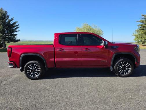 Volcanic Red Tintcoat 2023 GMC Sierra 1500 AT4