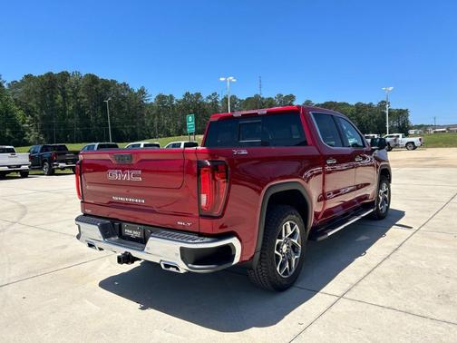 Volcanic Red Tintcoat 2026 GMC Sierra 1500 SLT