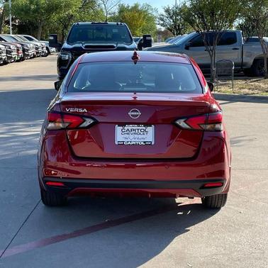 Scarlet Ember Tintcoat 2024 Nissan Versa 1.6 S