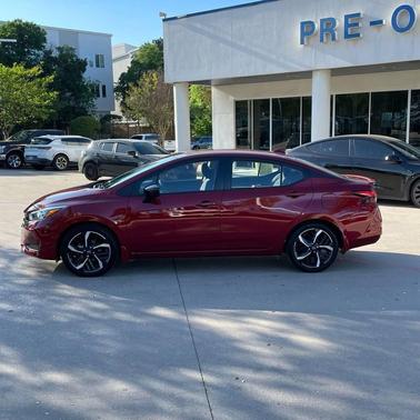 Scarlet Ember Tintcoat 2024 Nissan Versa 1.6 S