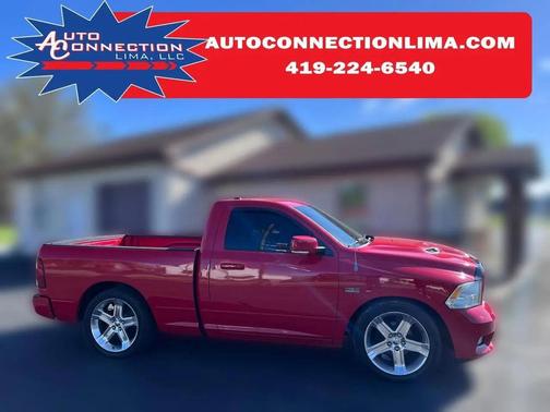 Red 2012 RAM 1500 Sport