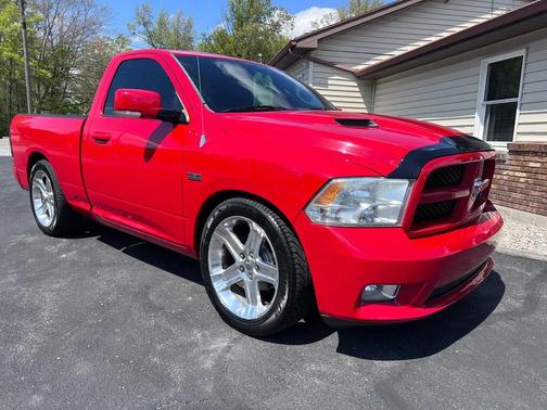 Red 2012 RAM 1500 Sport