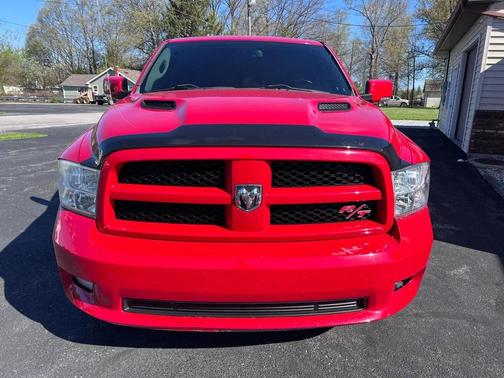 Red 2012 RAM 1500 Sport