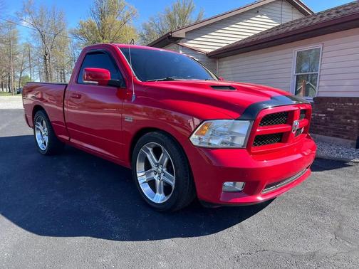 Red 2012 RAM 1500 Sport