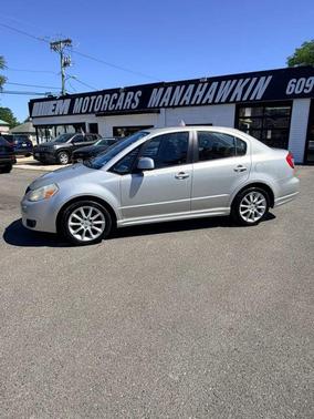 Quicksilver Metallic 2009 Suzuki SX4 Sport Sedan 4D