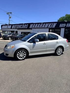 Quicksilver Metallic 2009 Suzuki SX4 Sport Sedan 4D