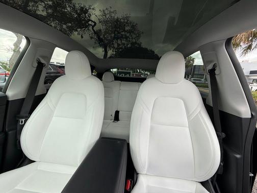 Solid Black 2025 Tesla Model Y Performance Dual Motor All-Wheel Drive