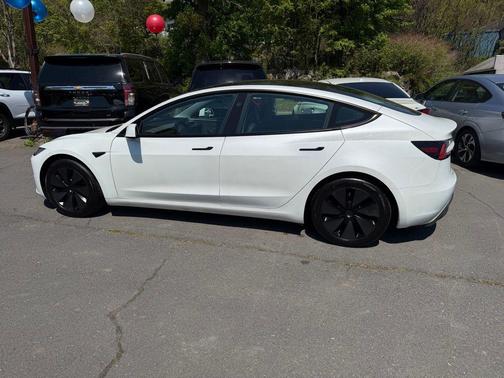 Pearl White Multi-Coat 2025 Tesla Model 3 Long Range