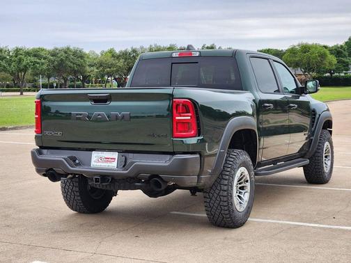 Serrano Green Metallic 2026 RAM 1500 RHO Crew Cab 4x4 5'7' Box