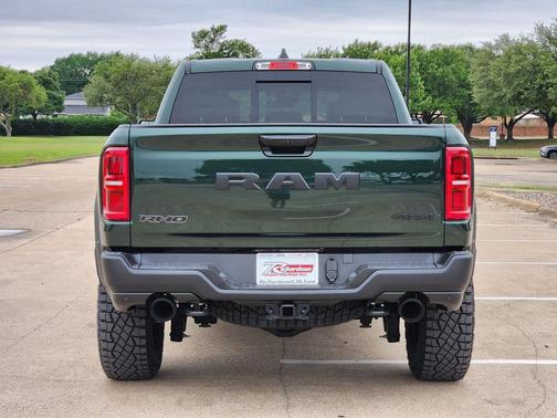 Serrano Green Metallic 2026 RAM 1500 RHO Crew Cab 4x4 5'7' Box