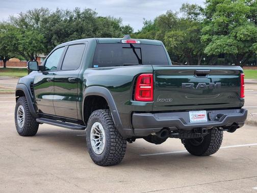 Serrano Green Metallic 2026 RAM 1500 RHO Crew Cab 4x4 5'7' Box