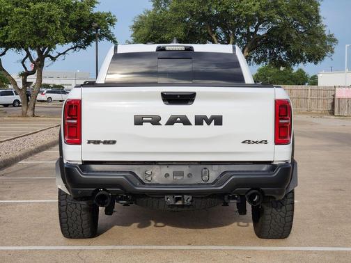 Bright White Clearcoat 2025 RAM 1500 RHO Crew Cab 4x4 5'7' Box