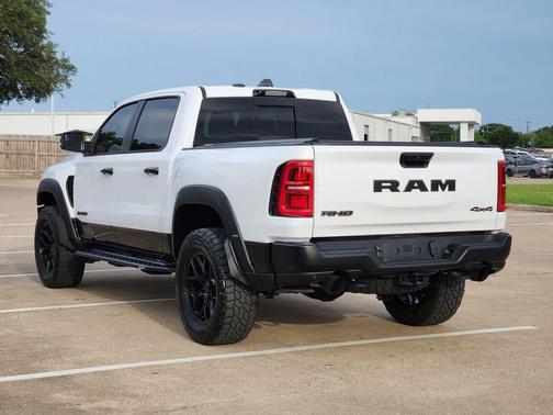 Bright White Clearcoat 2025 RAM 1500 RHO Crew Cab 4x4 5'7' Box