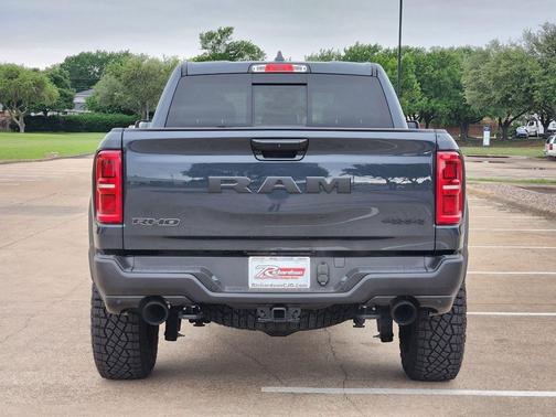 Forged Blue Metallic 2026 RAM 1500 RHO Crew Cab 4x4 5'7' Box
