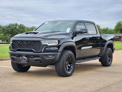 Diamond Black Crystal Pearlcoat 2026 RAM 1500 RHO Crew Cab 4x4 5'7' Box