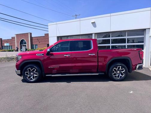 Volcanic Red Tintcoat 2024 GMC Sierra 1500 SLT
