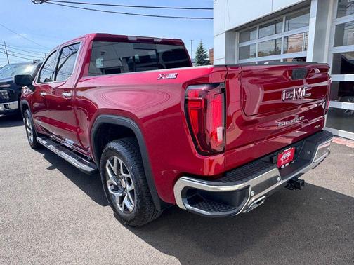 Volcanic Red Tintcoat 2024 GMC Sierra 1500 SLT