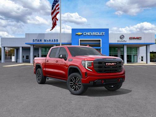 Volcanic Red Tintcoat 2026 GMC Sierra 1500 AT4