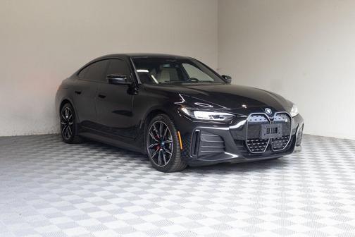 Black Sapphire Metallic 2024 BMW i4 Gran Coupe eDrive40