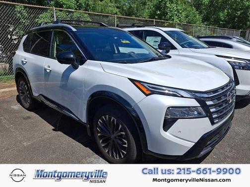 Everest White Pearl/Super Black 2025 Nissan Rogue Platinum
