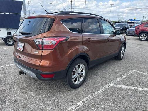 Orange 2017 Ford Escape SE
