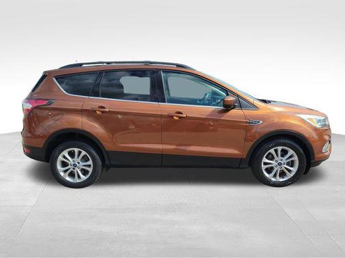 Orange 2017 Ford Escape SE