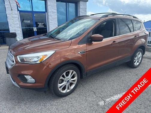 Orange 2017 Ford Escape SE