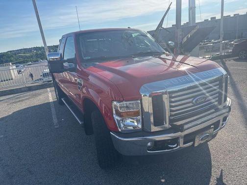 Red 2010 Ford F-250 XLT