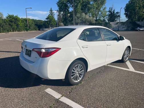 Super White 2015 Toyota Corolla LE Plus