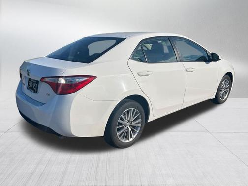 Super White 2015 Toyota Corolla LE Plus
