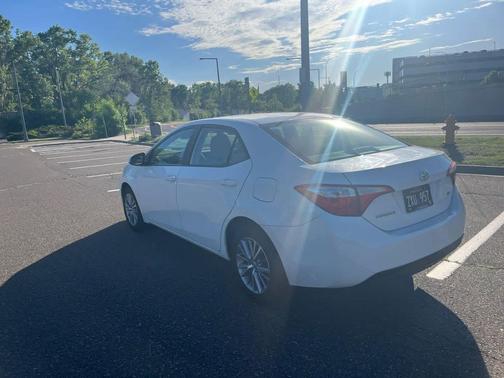 Super White 2015 Toyota Corolla LE Plus