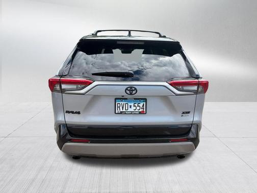 Silver Sky Metallic/Midnight Black Metallic 2025 Toyota RAV4 Hybrid SE