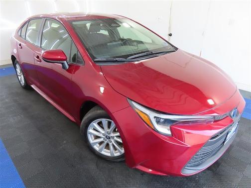 Red 2024 Toyota Corolla Hybrid LE