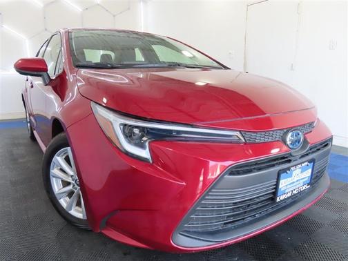 Red 2024 Toyota Corolla Hybrid LE