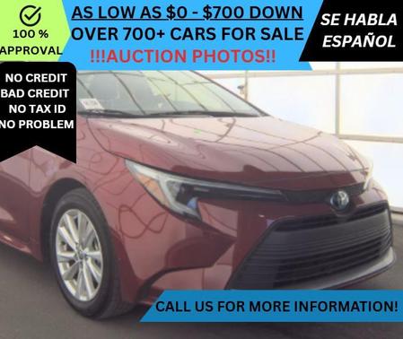 Red 2024 Toyota Corolla Hybrid XLE