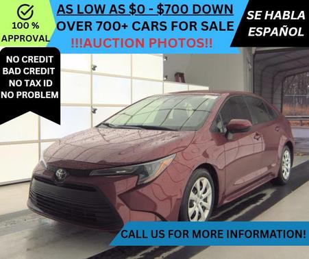 Red 2025 Toyota Corolla LE