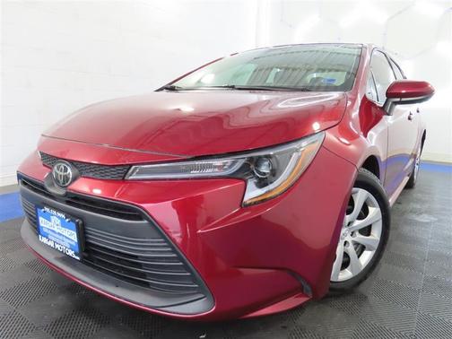 Red 2025 Toyota Corolla LE