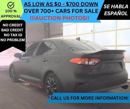 Red 2024 Toyota Corolla LE