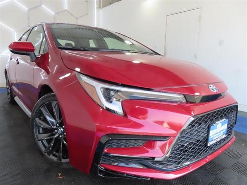 Red 2024 Toyota Corolla Hybrid SE