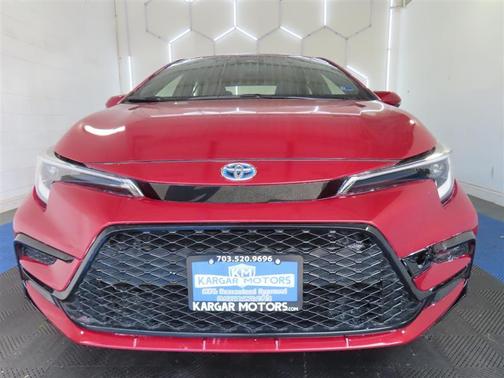 Red 2024 Toyota Corolla Hybrid SE