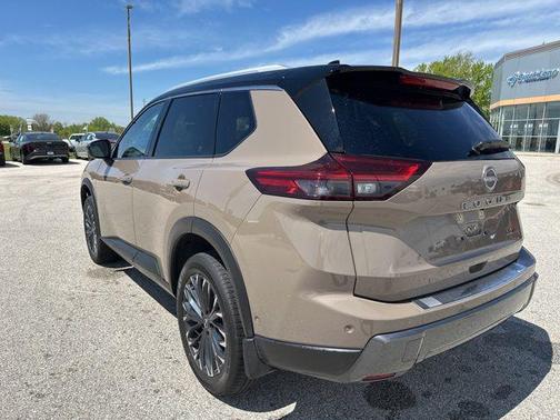 Baja Storm Metallic/Super Black 2025 Nissan Rogue SL