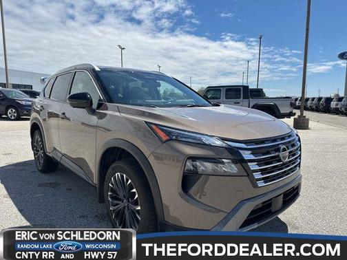 Baja Storm Metallic/Super Black 2025 Nissan Rogue SL