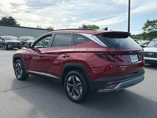 Red 2026 Hyundai TUCSON Hybrid SEL