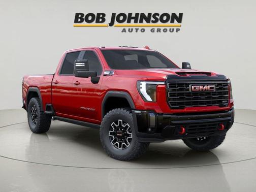 Volcanic Red Tintcoat 2026 GMC Sierra 2500 AT4X