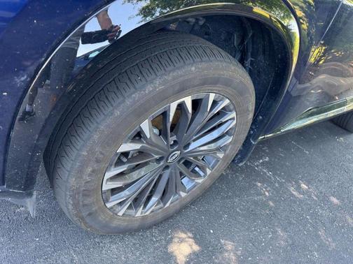 Deep Ocean Blue Pearl/Super Black 2024 Nissan Rogue Platinum