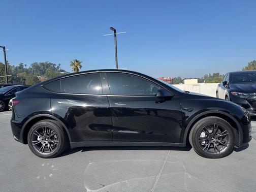 Solid Black 2024 Tesla Model Y Long Range Dual Motor All-Wheel Drive