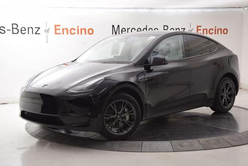 Solid Black 2024 Tesla Model Y Long Range Dual Motor All-Wheel Drive