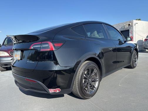 Solid Black 2024 Tesla Model Y Long Range Dual Motor All-Wheel Drive