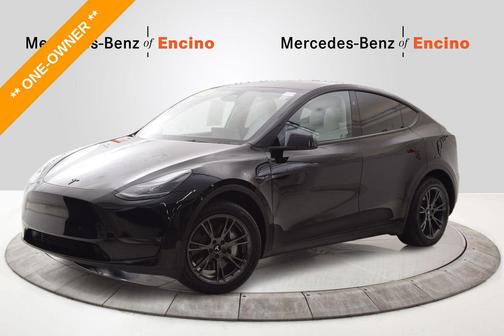 Solid Black 2024 Tesla Model Y Long Range Dual Motor All-Wheel Drive